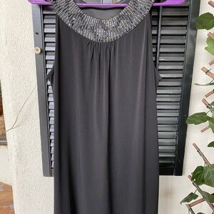 Elegant Black Dress with Embellished Neckline